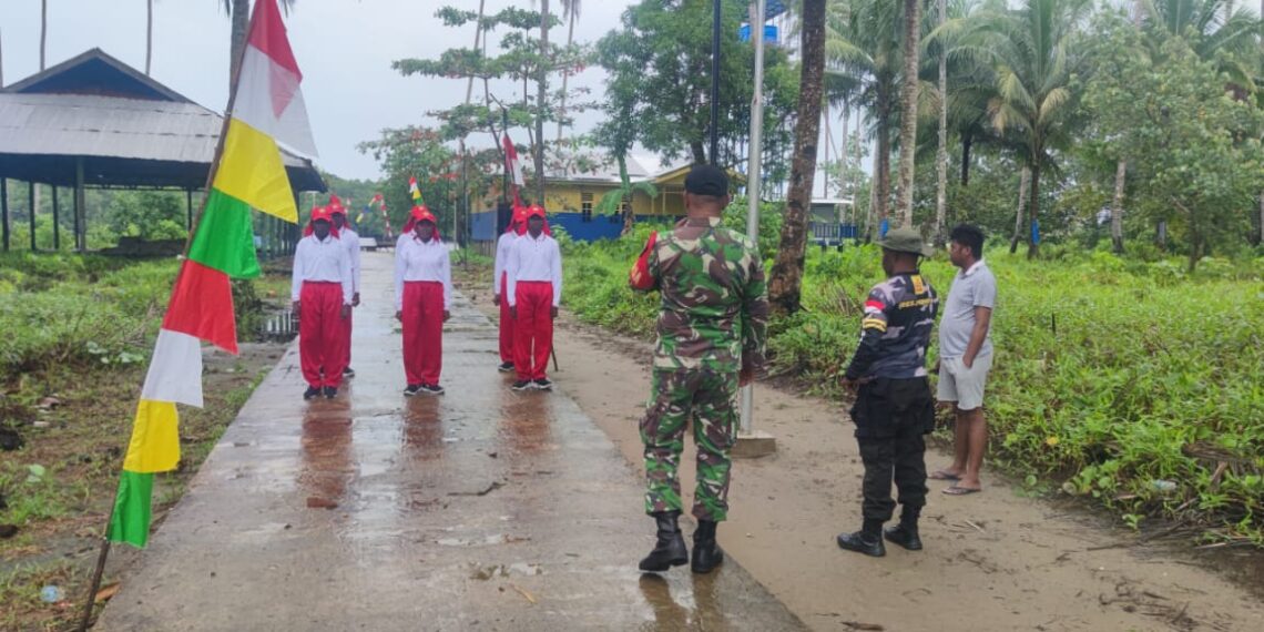 Babinsa Koramil 1710-01/Kokonao Latih Paskibra Distrik Mimika Barat, Siap Kibarkan Merah Putih Di HUT Ke-80 Republik Indonesia