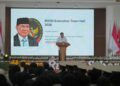 Menko Polkam Djamari Chaniago saat membuka acara BSSN Executive Town Hall 2026 di Depok, Jawa Barat, Senin (19/1/2026).