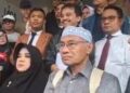 Tiga tersangka klaster pertama dalam kasus ijazah palsu Presiden ke-7 Joko Widodo, Rustam Efendi, Rizal Fadhilah, dan Kurnia Tri Royani, mendatangi Polda Metro Jaya, Kamis (22/1/2026).