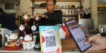 Bank Indonesia menargetkan QRIS merambah ke 8 negara dan menggandeng 45 juta merchant, mayoritas sektor mikro, untuk memperkuat kedaulatan Rupiah, Senin (16/2/2026).