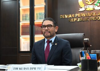Anggota Komisi III DPR RI Nasir Djamil saat hadir dalam persidangan melalui zoom di Ruang Konstitusi DPR RI, Senayan, Jakarta, Kamis (29/1/2026).