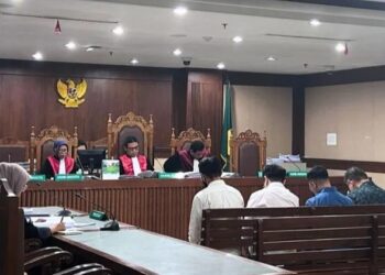 Nicko Widjaja dan William Gozal mengikuti sidang pembacaan dakwaan yang digelar di Pengadilan Tindak Pidana Korupsi (Tipikor) pada Pengadilan Negeri Jakarta Pusat, Senin (2/2/2026) malam.