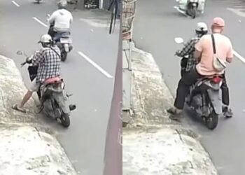 Tangkapan layar aksi pelaku saat menempelkan stiker barcode situs judi online pada sepeda motor warga yang sedang parkir di kawasan Pesanggrahan. (Foto: Dok. Istimewa/Medsos)