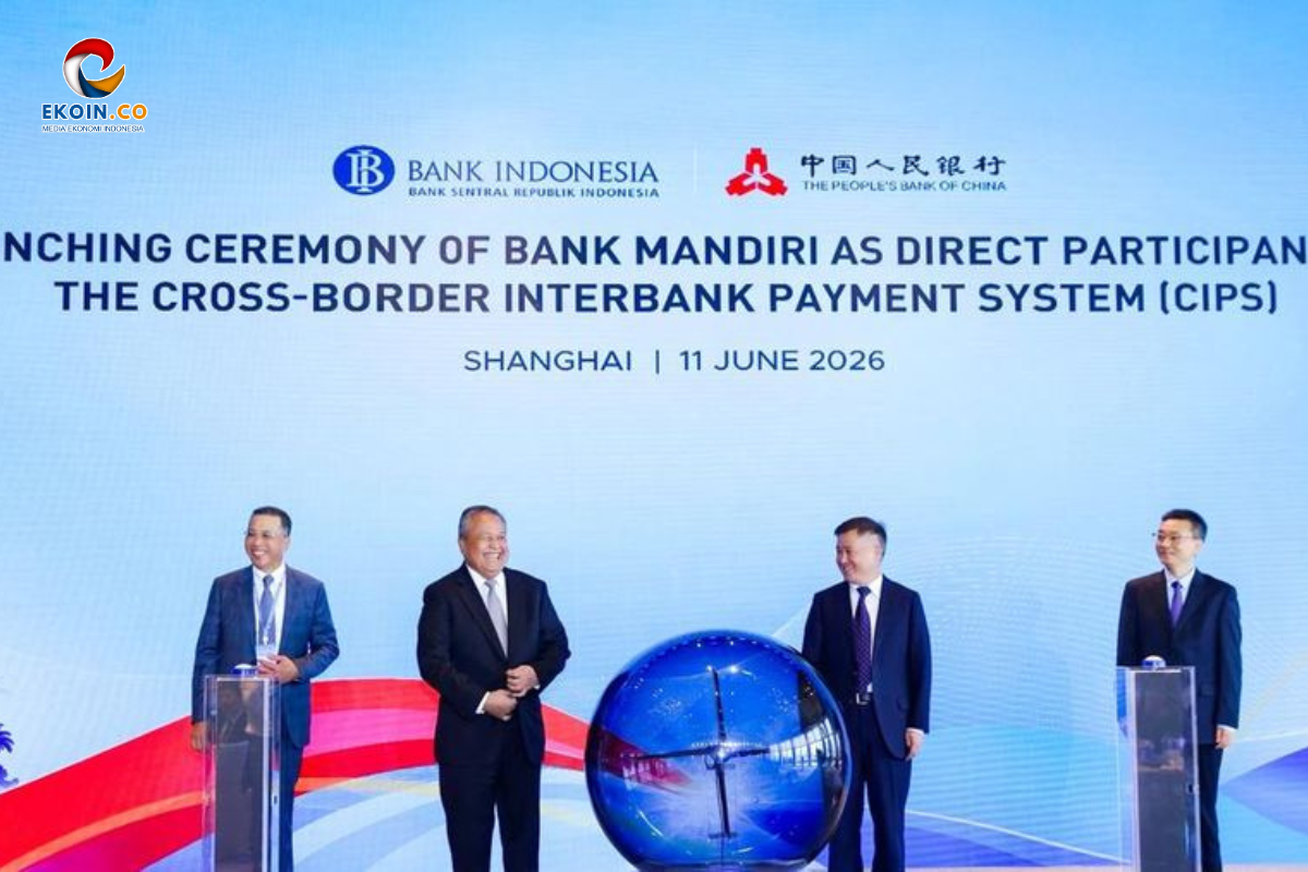 Launching ceremony banner for Bank Mandiri's participation in the Cross-Border Interbank Payment System (CIPS), Shanghai, June 11, 2026, with four executives on stage beside a globe.